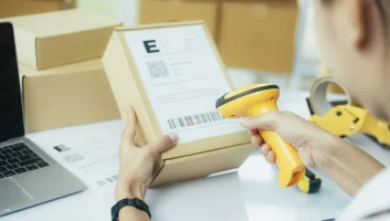 scanning-parcel-barcode-before-shipment-2023-11-14-22-56-53-utc-min-scaled